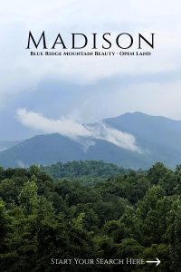 Blue Ridge Mountains with low clouds over forest in Madison County.