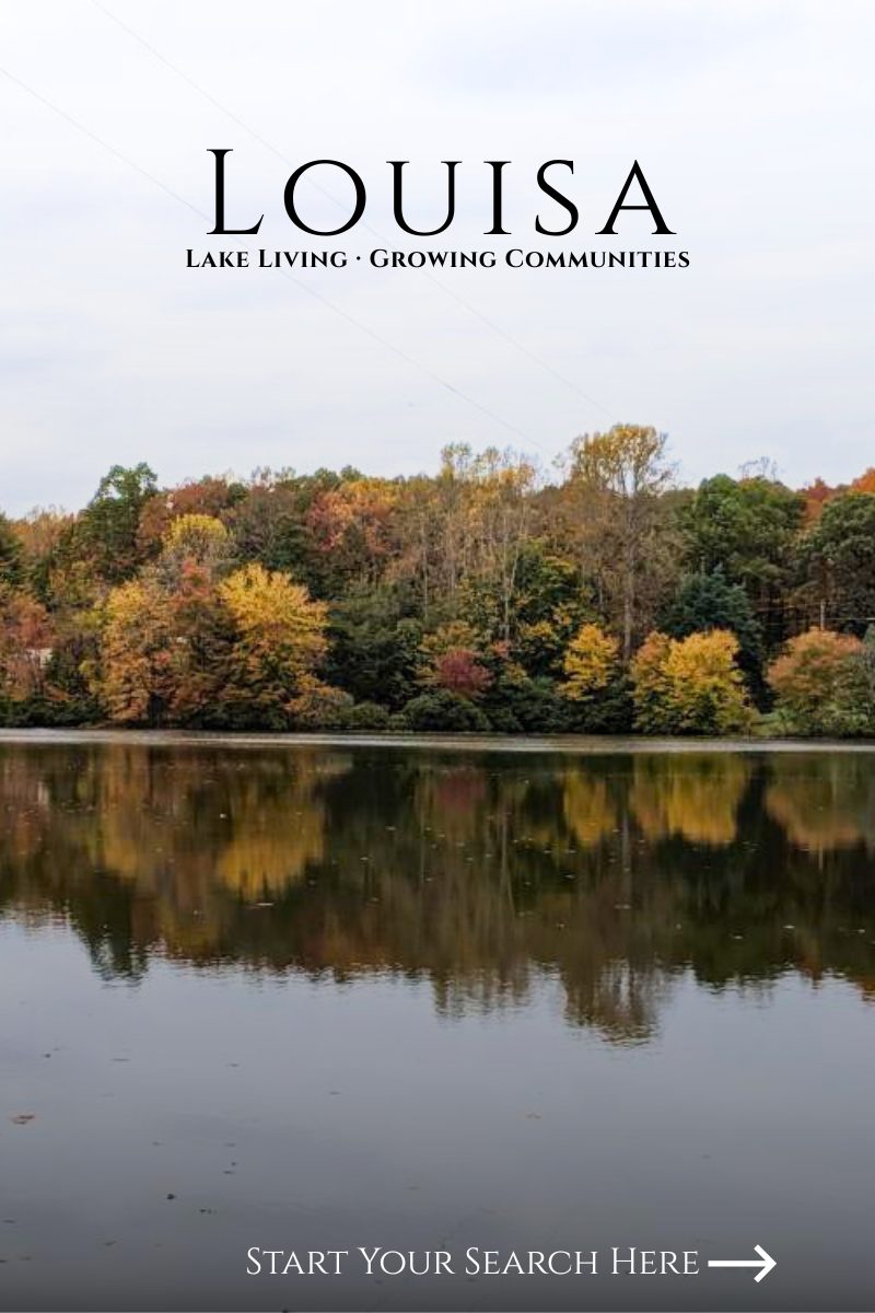 Calm lake reflecting autumn trees in Louisa County.